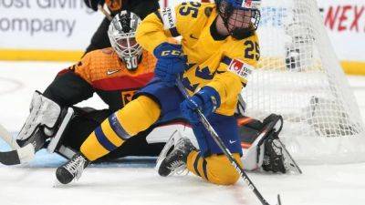 Sweden opens world women's hockey championship with win over Denmark