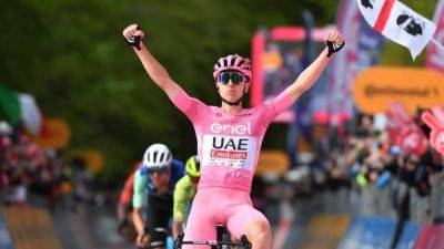 Tadej Pogacar - Team Emirates - Pogacar reigns supreme on final climb to win stage eight - channelnewsasia.com - Australia - Uae - Slovenia