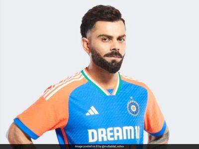 Virat Kohli - Rohit Sharma - Kuldeep Yadav - India's T20 World Cup Jersey Price Revealed. Delhi-Goa Flight Tickets Cost Less - sports.ndtv.com - India - Jersey