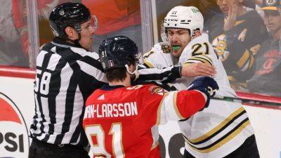 David Pastrnak - Matthew Tkachuk - Stanley Cup playoffs: Photos put intense Bruins-Panthers Game 2 in perspective - ESPN - espn.com