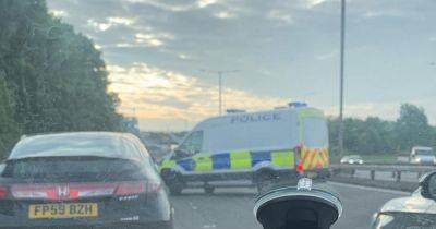Stretch of East Lancs Road closed off with emergency services on scene - manchestereveningnews.co.uk