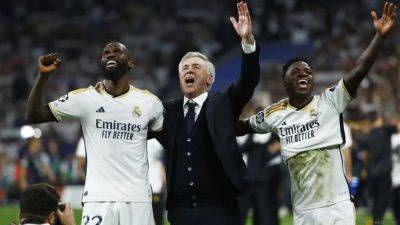 Carlo Ancelotti - Alphonso Davies - Ancelotti hails Real's Champions League 'magic' after semi-final win - channelnewsasia.com - Germany - Italy